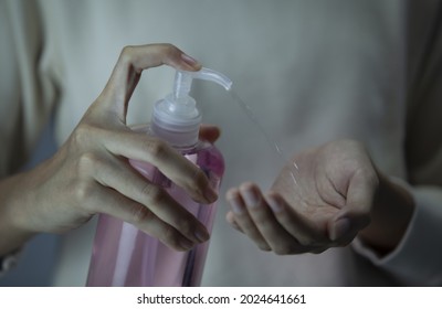 Close Up Hand Applying Alcohol Gel Or Anti Bacteria Soap To Make Cleaning And Clear Germ, Bacteria 