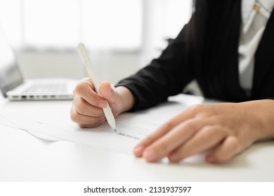 Close Up Hand Business Woman Manager Checking Documents Reports Papers Company Application Form Or Registering Claim Contract Documents In Office.