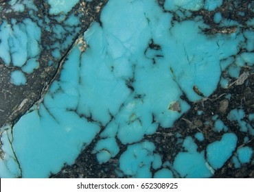 Close Up Of Hand Carved Turquoise Stone