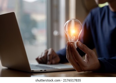 Close Up Hand Choose Light Bulb Or Lamp With Bright For Human Resources Or Leadership And Creativity Thinking Idea Motivation Or Vision And Knowledge Learning.