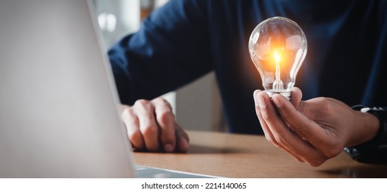 Close Up Hand Choose Light Bulb Or Lamp With Bright For Human Resources Or Leadership And Creativity Thinking Idea Motivation Or Vision And Knowledge Learning.