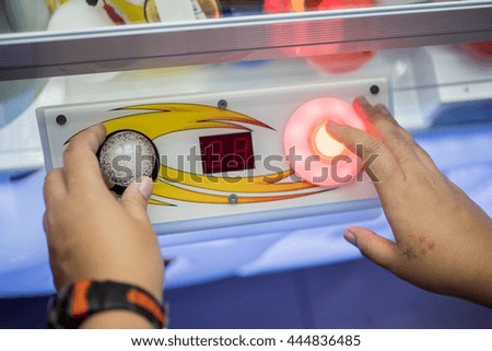 Close up hand control joystick of arcade,Vintage tone.