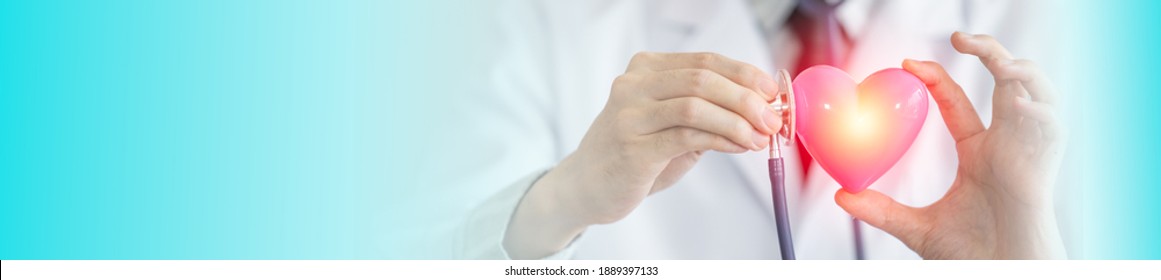 Close Up Hand Of Doctor Hold And Using Stethoscope Touch To Examining Heart, Health And Care Concept. Image Standard Horizontal Web Banners.