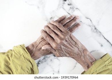 close up of hand of a elderly person isolated on white 