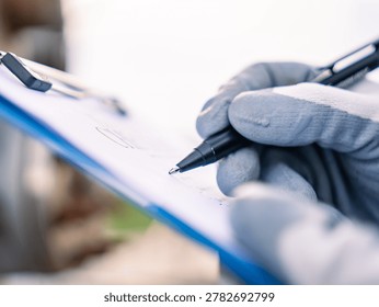 Close up hand engineer Report working  management air pollution reduction, continuous emission monitoring system factory and industry manufacturing. Clean air Eco friendly. Environment sustainable.