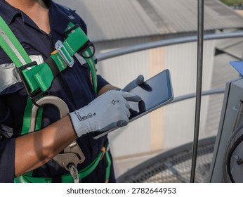 Close up hand engineer using digital tablet management air pollution reduction, continuous emission monitoring system factory and industry manufacturing. Clean air Eco friendly. Environment sustainable