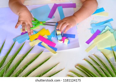 Close Up Hand Happy Kids Doing Arts And Crafts Together At Their Desk. Child Make Paper Colorful Garland For Sukkah-Jewish Holiday.