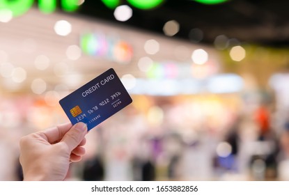 Close Up Hand Hold Credit Card Shopping And Pay By Credit Card On Department Store