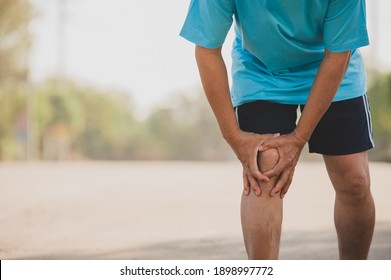 Close up hand hold knee, Senior Man are knee pain