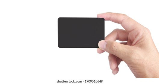 Close Up Of Hand Holding Blank Black Card. Credit Card In Hand Isolated