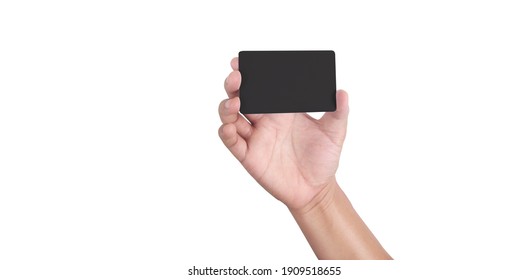 Close Up Of Hand Holding Blank Black Card. Credit Card In Hand Isolated