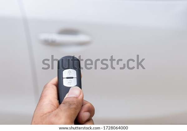 Close up Hand holding car
key