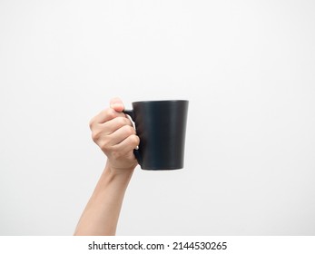 Close up hand holding coffee cup white isolated