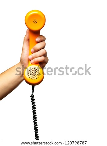 Close Up Of Hand Holding Telephone against a white background
