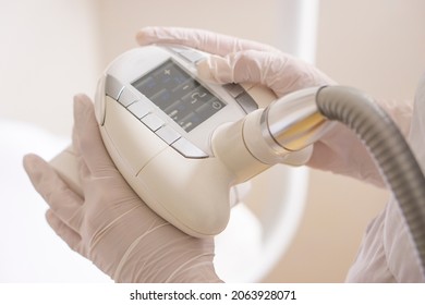 Close up hand holding of vacuum roller massage apparatus . Endermologie is the only non-invasive method designed to reduce the appearance of cellulite. - Shutterstock ID 2063928071