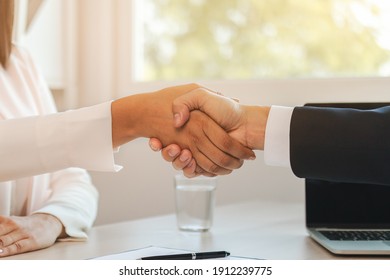 Close Up Hand Of Home, Apartment Agent Or Realtor Handshake With Newlandlord, Tenant Or Rental. After The Banker Has Approved And Signed The Purchase Contract Agreement Successfully. Property Concept.