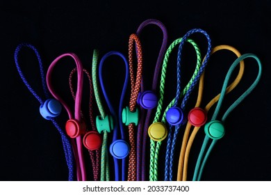 Close Up Of A Hand Made Face Mask Lanyard. Metal Hook, Cord Stopper, Colourful Parachute Cord.