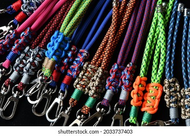 Close Up Of A Hand Made Face Mask Lanyard. Metal Hook, Cord Stopper, Colourful Parachute Cord.