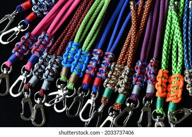 Close Up Of A Hand Made Face Mask Lanyard. Metal Hook, Cord Stopper, Colourful Parachute Cord.