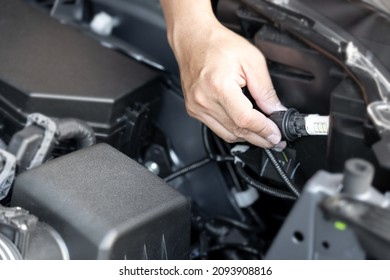 Close Up Hand A Man LED Bulbs Are Being Inserted Into The Headlights Of The Car Basic Service Concept Do It Yourself Easily Of Car