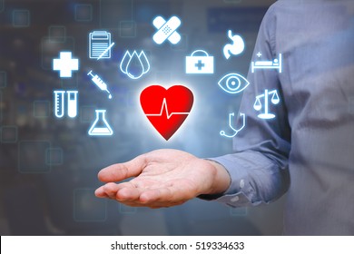 Close Up Of Hand Man Show Holding Heart In Palm ,Healthcare Concept.