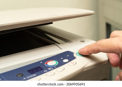 Close Up Hand Of Office Man Press The Copy Button On Panel To Using The Copier Or Photocopier Machine In Copy Room For Scanning Document Printing