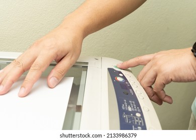 Close Up Hand Of Office Man Press The Copy Button On Panel To Using The Copier Or Photocopier Machine In Copy Room For Scanning Document Printing