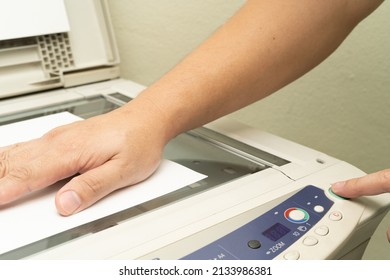 Close Up Hand Of Office Man Press The Copy Button On Panel To Using The Copier Or Photocopier Machine In Copy Room For Scanning Document Printing