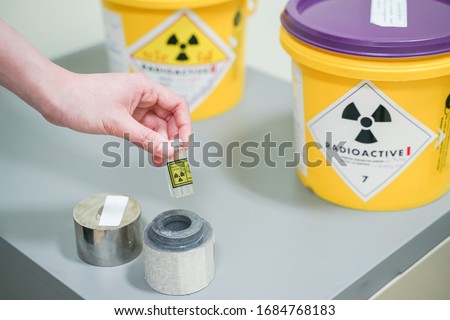 close up hand open lead box of Iodine 131(I-131)Radioactive isotopes used for hyperthyroidism treatment.