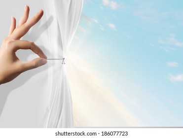 Close Up Of Hand Opening The White Curtain