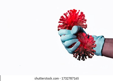 close up hand in sterile gloves cling to corona virus on black background. Win fight covid-19 corona virus. cure corona virus. people fight virus concept.	
 - Shutterstock ID 1732787165