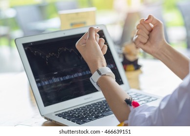 Close Up Hand Successful Trader With Laptop Computer In Coffee Shop