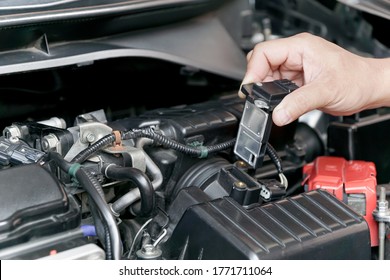 Close Up Hand A Technician Remove Airflow Sensor In The Engine Room Car For Check And Cleaning In Service Concept