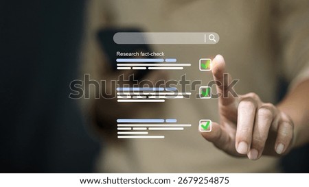 Close up hand touching screen with research fact-check results and verification checklist, concept of online research, digital literacy, information accuracy.