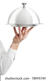 Close Up Hand Of Waiter With Metal Cloche Lid Cover And Tray