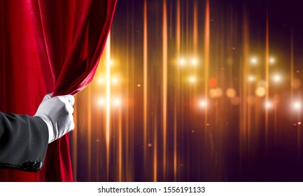 Close Up Of Hand In White Glove Open Red Velvet Curtain To Stage