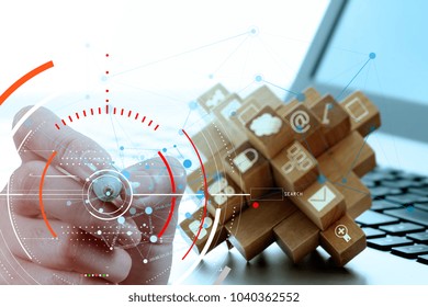 Close up of Hand working with touch screen computer technology.