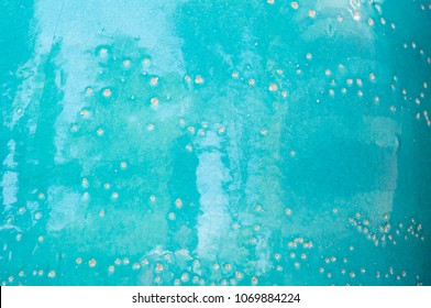 Close Up Handmade Glazed Pottery Ceramic Art Texture Surface, Bright Turquois Or Sapphire Blue Tone With Random Beige Dot. Abstract Vintage, Contemporary, Antique Style Wallpaper Background.