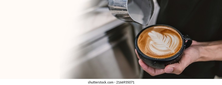 Close up hands of barista make coffee latte art with coffee espresso machine in coffee shop cafe in vintage color tone. Morning routine aroma coffee lifestyle urban people concept. - Powered by Shutterstock