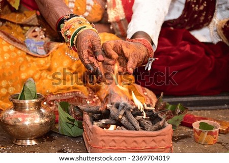 Close of hands of couple getting married, Indian Wedding Male Females during wedding rituals known as Kanyadaan, Close up 