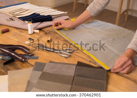 Similar – Image, Stock Photo Dressmaker cutting a cloth