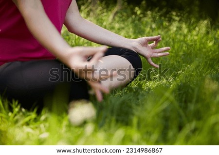 Close up of hands or feet doing yoga, sports or meditating in park, nature or forest in sunshine.