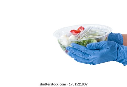 Close Up Of Hands With Glove With Fast Food On A White Background. Food Delivery And Donation Mockup Template With Copy Space