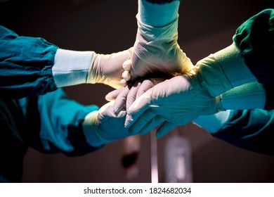 Close Up Hands Group And Teamwork Of Surgeons In Hospital Operating Room. Teamwork Medical Doctor Working  Performing Surgery