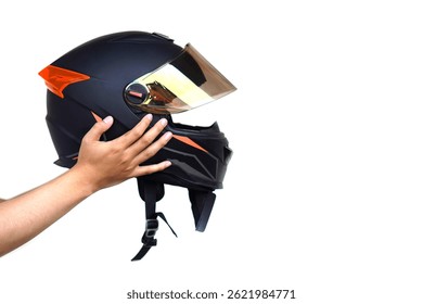 Close up hands hold helmet, isolated on white background. Concept: safety in transportation. Helmet helps prevent head injuries in accidents. Campaign to wear helmet when riding a motorcycle.         