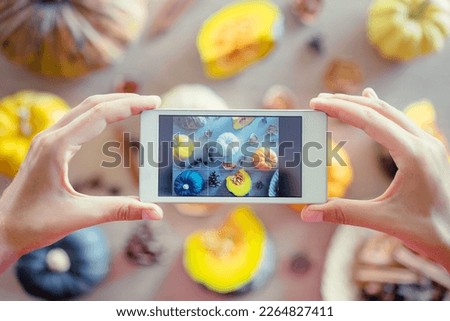 Similar – Image, Stock Photo Young hands taking photos with smartphones to vegetable skewers