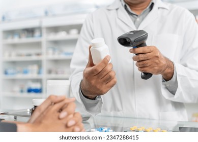 Close up hands of male pharmacist using barcode scanner for selling medicine to patient customer in the pharmacy drugstore, hand over capsule pills of medicine from hand to another hand charge. - Powered by Shutterstock