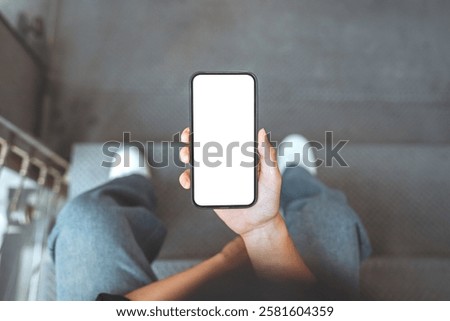 Close up - Hands of man using mobile phone blank white screen mockup, Background empty space for advertise, technology