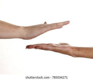 Close Up Of Hands Of Man And Woman Doing A High Five Isolated On White Background