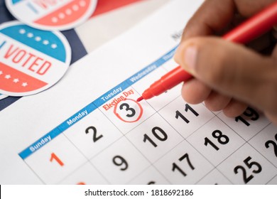 Close Up Of Hands Marking November 3 Election Day On Calendar As Reminder For Voting - Concept Of Reminder For US Election.